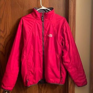 North Face zip up jacket.